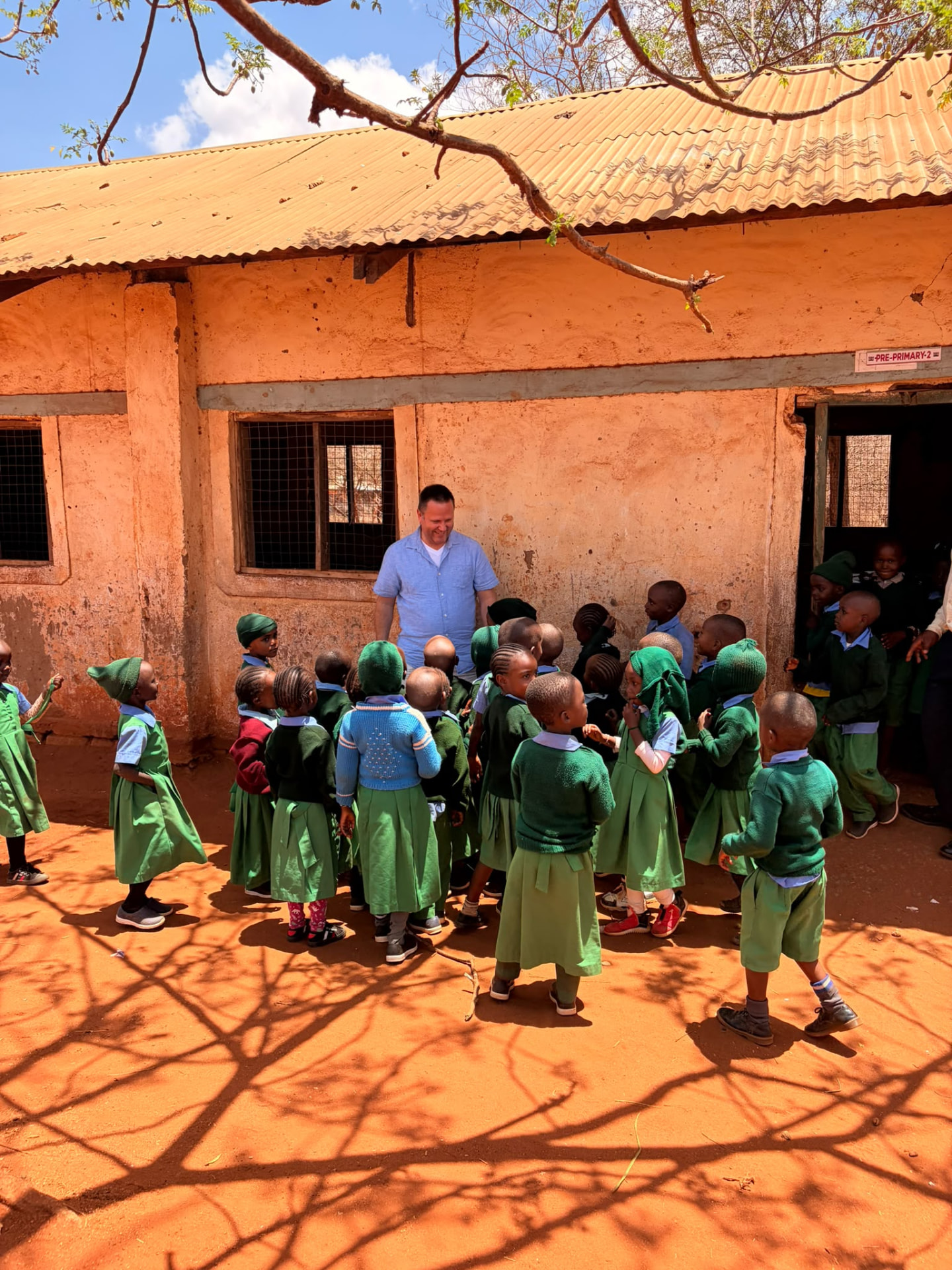 Children gathered in the schoolyard in Ndatani