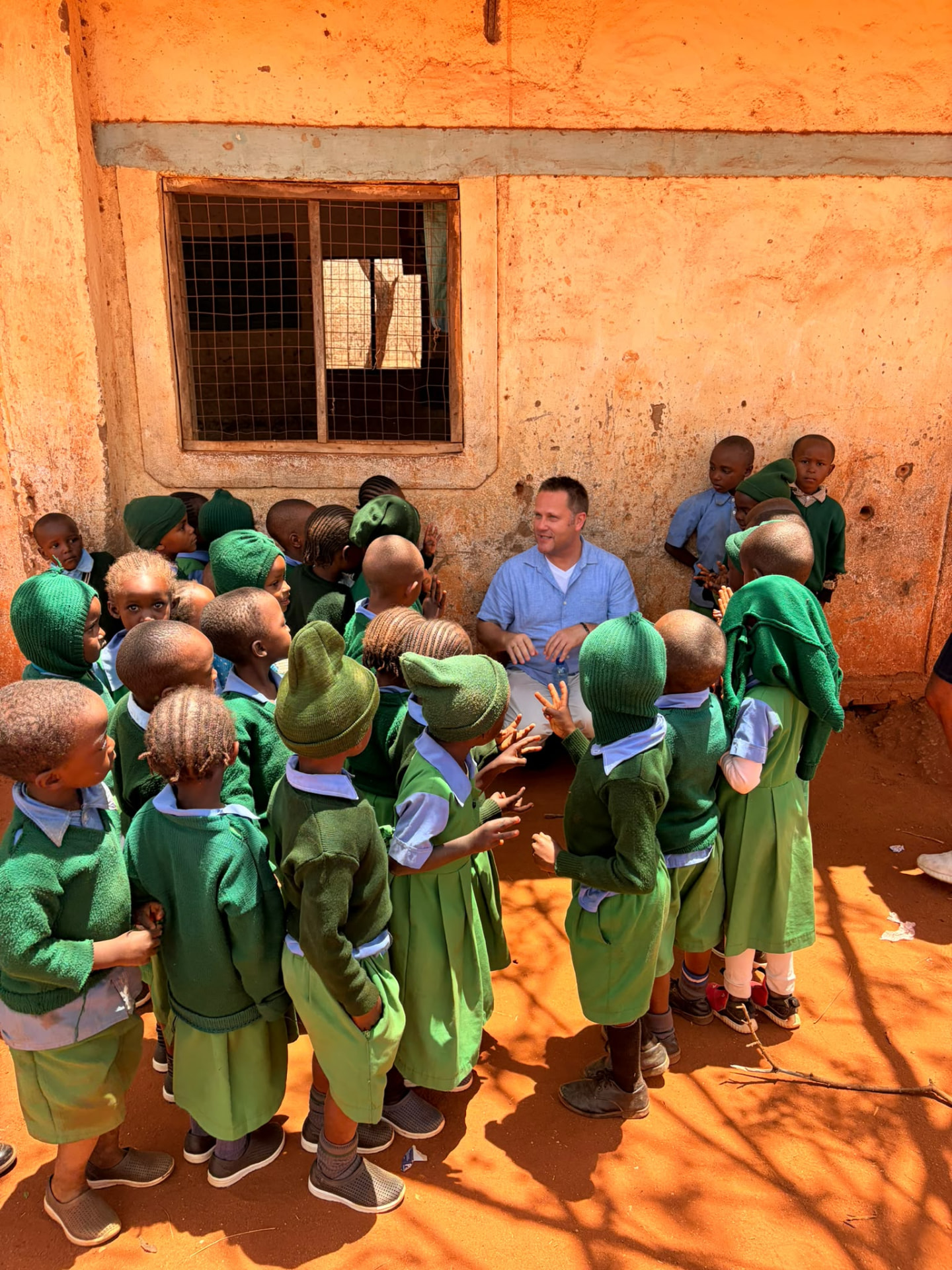 Community members gathered at the Ndatani school building